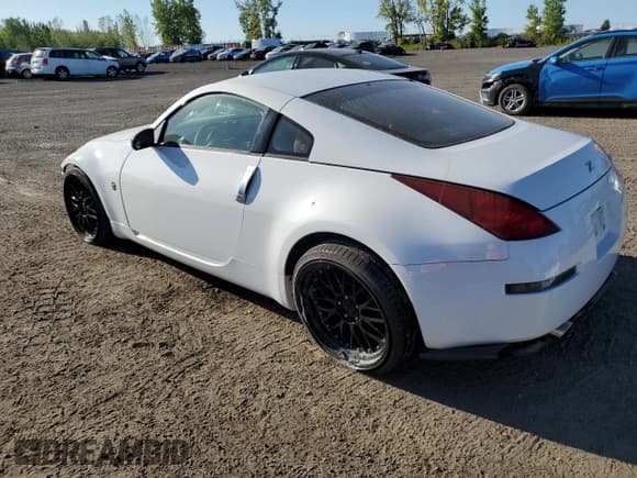 ✅ 2003 Nissan 350Z Touring • VIN: JN1AZ34E53T017013 • Lot: 72063705. Listed on Copart with 107,704 mi. Free auction sales archive from the USA and detailed vehicle history report at DreamBid. Image 2.