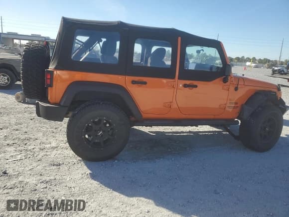 ✅ 2012 Jeep Wrangler Unlimited Sport • VIN: 1C4BJWDG8CL211658 • Lot: 92809525. Listed on Copart with 29,424 mi. Free auction sales archive from the USA and detailed vehicle history report at DreamBid. Image 3.