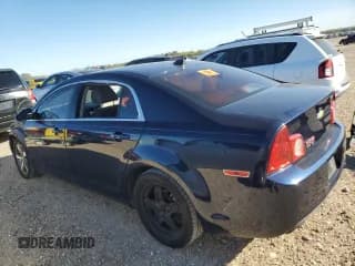 ✅ 2012 Chevrolet Malibu 1LS • VIN: 1G1ZB5E08CF268988 • Lot: 81376964. Listed on Copart with 147,210 mi. Free auction sales archive from the USA and detailed vehicle history report at DreamBid. Image 2.