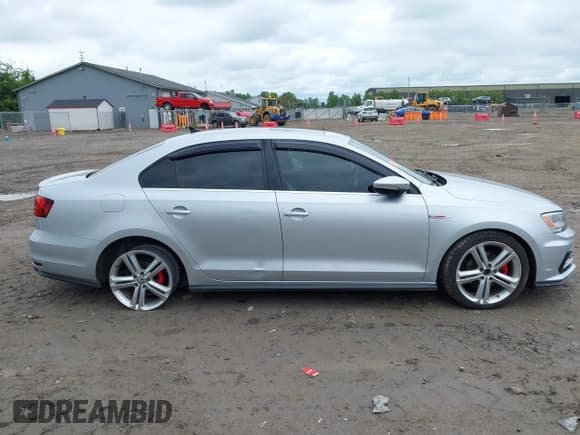 ✅ 2016 Volkswagen Jetta GLI SE • VIN: 3VW4T7AJ7GM222502 • Lot: 43006577. Wystawiony na IAAI z przebiegiem 102 488 mil. Bezpłatny archiwum sprzedaży aukcyjnych z USA i szczegółowy raport historii pojazdu na DreamBid. Zdjęcie 13.