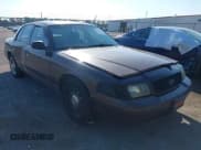 ✅ 2006 Ford Police Interceptor • VIN: 2FAFP71WX6X142938 • Lot: 42973319. Listed on IAAI with 168,497 mi. Free auction sales archive from the USA and detailed vehicle history report at DreamBid. Image 1.