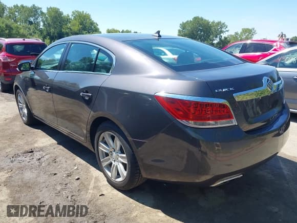 ✅ 2013 Buick LaCrosse Leather • VIN: 1G4GC5E30DF120367 • Лот: 43093786. Опубликован ранее на IAAI с пробегом 132 953 миль. Бесплатный доступ к архиву аукционных продаж из США и подробный отчёт об истории автомобиля на DreamBid. Изображение 3.