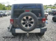 ✅ 2014 Jeep Wrangler Unlimited Sahara • VIN: 1C4BJWEG0EL258765 • Lot: 84206115. Wystawiony na Copart z przebiegiem 143 903 mil. Bezpłatny archiwum sprzedaży aukcyjnych z USA i szczegółowy raport historii pojazdu na DreamBid. Zdjęcie 6.