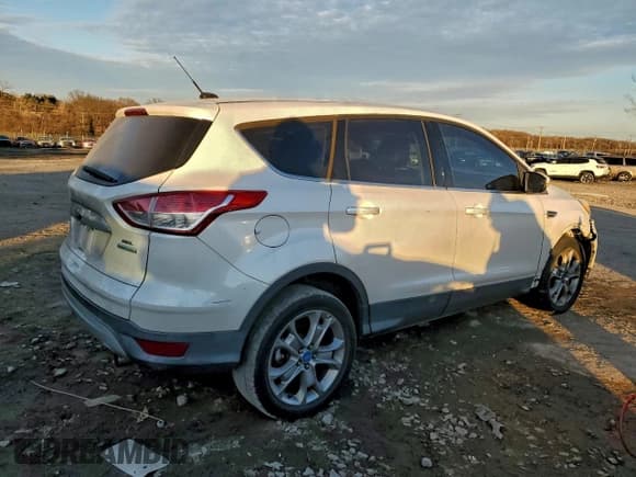 ✅ 2013 Ford Escape SEL • VIN: 1FMCU0HX4DUA88225 • Лот: 96410095. Опубликован ранее на Copart с пробегом 140 747 миль. Бесплатный доступ к архиву аукционных продаж из США и подробный отчёт об истории автомобиля на DreamBid. Изображение 3.