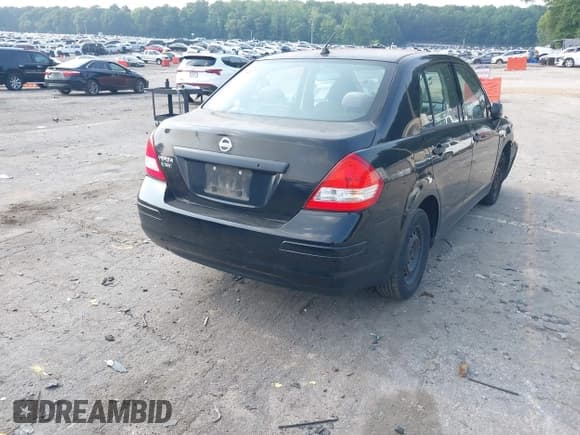 ✅ 2010 Nissan Versa 1.6 Base • VIN: 3N1CC1AP5AL378232 • Lot: 42419190. Listed on IAAI with 309,583 mi. Free auction sales archive from the USA and detailed vehicle history report at DreamBid. Image 4.