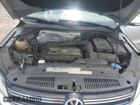 ✅ 2012 Volkswagen Tiguan LE • VIN: WVGAV7AX3CW577127 • Lot: 62021155. Listed on Copart with 103,605 mi. Free auction sales archive from the USA and detailed vehicle history report at DreamBid. Image 12.