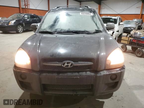2006 Hyundai Tucson GL z VIN KM8JM12B96U289857, wystawiony jako Copart lot #83230864 z przebiegiem 222 817 mil mil oraz Szkoda całkowita • Salvage title. Historia ofert i sprzedaży dostępna na DreamBid. Obrazek 5.