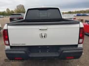 ✅ 2019 Honda Ridgeline RTL • VIN: 5FPYK2F5XKB004418 • Lot: 43572773. Listed on IAAI with 70,040 mi. Free auction sales archive from the USA and detailed vehicle history report at DreamBid. Image 16.