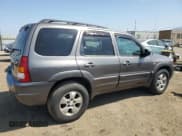 ✅ 2003 Mazda Tribute LX • VIN: 4F2YZ04153KM46892 • Lot: 60154915. Listed on Copart with 223,160 mi. Free auction sales archive from the USA and detailed vehicle history report at DreamBid. Image 3.