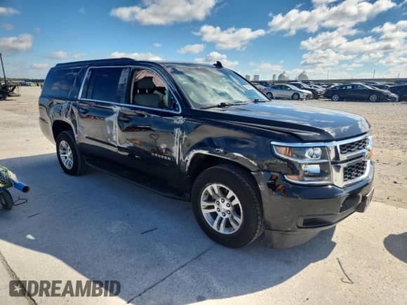 2019 Chevrolet Suburban LT z VIN 1GNSCHKCXKR161435, wystawiony jako Copart lot #90894635 z przebiegiem 189 459 mil mil oraz Czysty tytuł • Clean title. Historia ofert i sprzedaży dostępna na DreamBid. Obrazek 4.