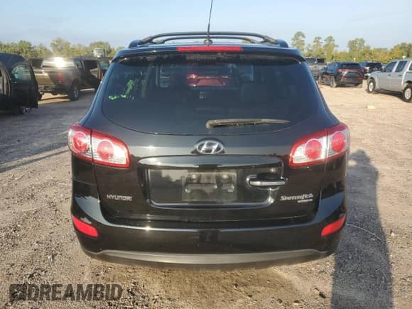 2011 Hyundai Santa Fe Limited с VIN 5XYZK3AB9BG071763, выставлен на аукционе Copart как лот 82711285 с пробегом 134 234 миль миль и Списание • Salvage title. История ставок и продаж доступна на DreamBid. Изображение 6.