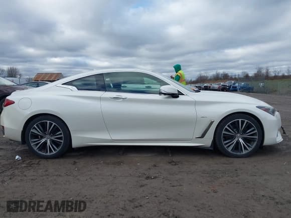 ✅ 2017 Infiniti Q60 Premium • VIN: JN1EV7ELXHM552809 • Lot: 43753892. Wystawiony na IAAI z przebiegiem 77 146 mil. Bezpłatny archiwum sprzedaży aukcyjnych z USA i szczegółowy raport historii pojazdu na DreamBid. Zdjęcie 13.