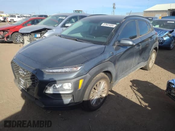 ✅ 2018 Hyundai Kona SEL • VIN: KM8K2CAA1JU080636 • Лот: 37941434. Опубликован ранее на Copart с пробегом 89 956 миль. Бесплатный доступ к архиву аукционных продаж из США и подробный отчёт об истории автомобиля на DreamBid. Изображение 1.