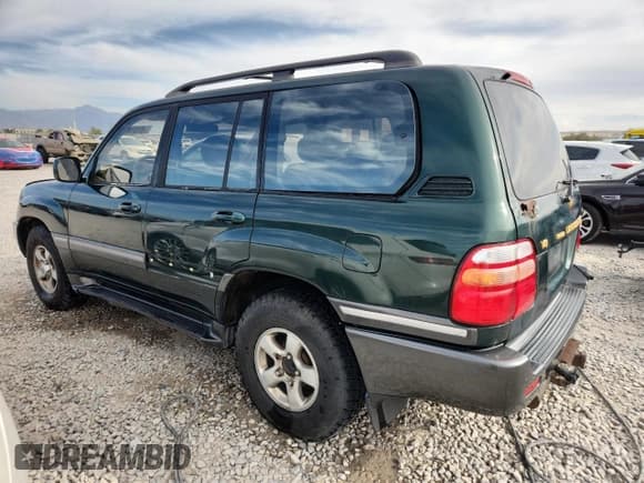 ✅ 2000 Toyota Land Cruiser • VIN: JT3HT05J1Y0096202 • Lot: 81318485. Listed on Copart with 272,727 mi. Free auction sales archive from the USA and detailed vehicle history report at DreamBid. Image 2.