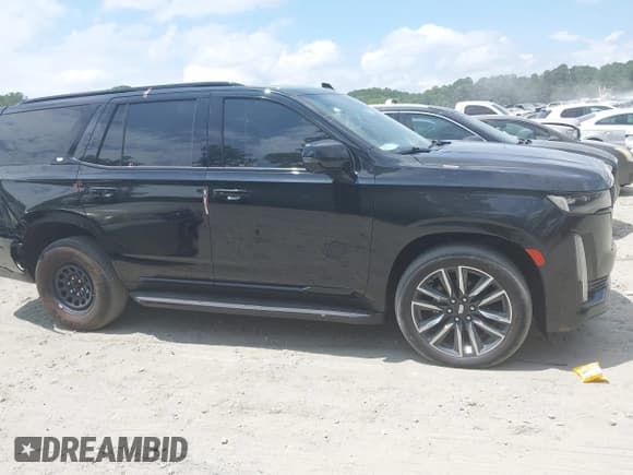 ✅ 2023 Cadillac Escalade 4WD Sport • VIN: 1GYS4EKL4PR415940 • Лот: 42782247. Опубликован ранее на IAAI с пробегом 48 681 миль. Бесплатный доступ к архиву аукционных продаж из США и подробный отчёт об истории автомобиля на DreamBid. Изображение 13.