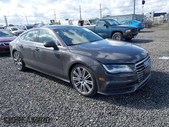 ✅ 2012 Audi A7 Prestige • VIN: WAU2GAFC0CN073224 • Лот: 41942757. Опубликован ранее на IAAI с пробегом 98 509 миль. Бесплатный доступ к архиву аукционных продаж из США и подробный отчёт об истории автомобиля на DreamBid. Изображение 1.