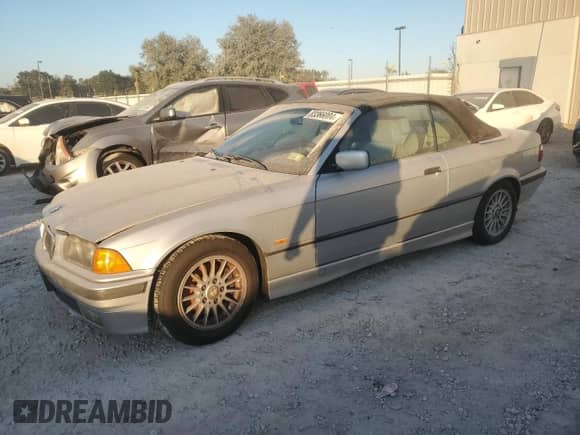 1998 BMW 3 Series 328i с VIN WBABK8330WEY89818, выставлен на аукционе Copart как лот 41557015 с пробегом 253 522 миль миль и На запчасти • Non repairable. История ставок и продаж доступна на DreamBid. Изображение 1.