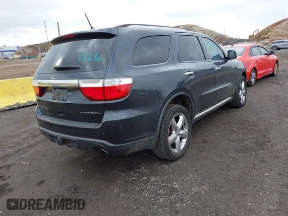 ✅ 2013 Dodge Durango Citadel • VIN: 1C4SDJET0DC652403 • Lot: 43681826. Listed on IAAI with 165,484 mi. Free auction sales archive from the USA and detailed vehicle history report at DreamBid. Image 4.