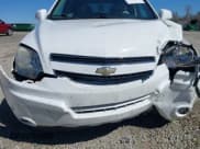 ✅ 2013 Chevrolet Captiva Sport LT • VIN: 3GNAL3EK0DS611482 • Lot: 41769541. Wystawiony na IAAI z przebiegiem 191 805 mil. Bezpłatny archiwum sprzedaży aukcyjnych z USA i szczegółowy raport historii pojazdu na DreamBid. Zdjęcie 6.