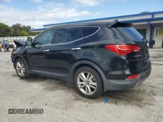 ✅ 2013 Hyundai Santa Fe Sport • VIN: 5XYZW3LA1DG026313 • Лот: 90320315. Опубликован ранее на Copart с пробегом 132 227 миль. Бесплатный доступ к архиву аукционных продаж из США и подробный отчёт об истории автомобиля на DreamBid. Изображение 2.