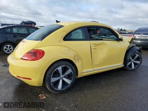 ✅ 2015 Volkswagen Beetle • VIN: 3VWH17AT4FM636845 • Лот: 81332594. Опубликован ранее на Copart с пробегом 87 369 миль. Бесплатный доступ к архиву аукционных продаж из США и подробный отчёт об истории автомобиля на DreamBid. Изображение 3.