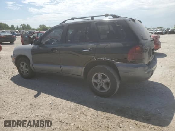 ✅ 2004 Hyundai Santa Fe GLS • VIN: KM8SC13E24U667076 • Lot: 69089595. Listed on Copart with 203,786 mi. Free auction sales archive from the USA and detailed vehicle history report at DreamBid. Image 2.