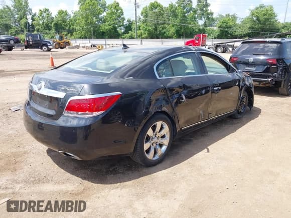✅ 2013 Buick LaCrosse Premium 2 • VIN: 1G4GH5G31DF214272 • Лот: 42565711. Опубликован ранее на IAAI с пробегом 127 949 миль. Бесплатный доступ к архиву аукционных продаж из США и подробный отчёт об истории автомобиля на DreamBid. Изображение 4.