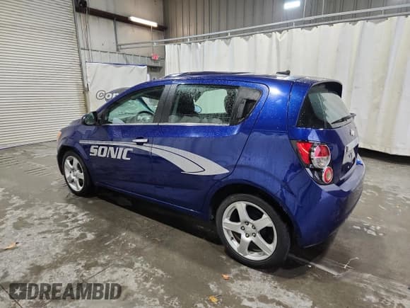✅ 2013 Chevrolet Sonic LTZ • VIN: 1G1JE6SB3D4211398 • Lot: 93627505. Listed on Copart with 109,453 mi. Free auction sales archive from the USA and detailed vehicle history report at DreamBid. Image 2.