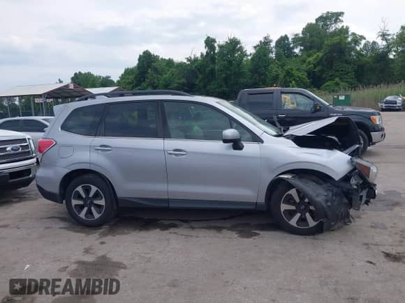 2017 Subaru Forester Limited with VIN JF2SJALC7HH521507, listed as a IAAI auction lot 42380182 with 60,733 mi miles and . Bid and sale history available at DreamBid. Image 14.