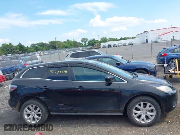 ✅ 2009 Mazda CX-7 Sport • VIN: JM3ER29L190217033 • Lot: 42777594. Listed on IAAI with 158,434 mi. Free auction sales archive from the USA and detailed vehicle history report at DreamBid. Image 12.
