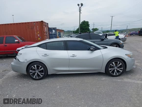 ✅ 2016 Nissan Maxima SR • VIN: 1N4AA6AP8GC407031 • Lot: 42453395. Listed on IAAI with 204,155 mi. Free auction sales archive from the USA and detailed vehicle history report at DreamBid. Image 13.