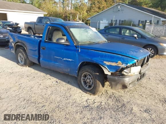 1998 Dodge Dakota SLT z VIN 1B7FL26X1WS608656, wystawiony jako IAAI lot #43318630 z przebiegiem 153 876 mil mil oraz . Historia ofert i sprzedaży dostępna na DreamBid. Obrazek 1.