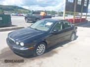 ✅ 2003 Jaguar X-Type 2.5L Manual • VIN: SAJEA51D13XD29839 • Лот: 43072383. Опубликован ранее на IAAI с пробегом 160 247 миль. Бесплатный доступ к архиву аукционных продаж из США и подробный отчёт об истории автомобиля на DreamBid. Изображение 2.