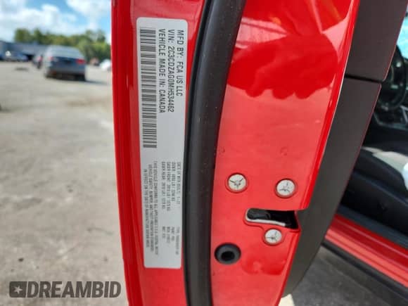 2021 Dodge Challenger SXT z VIN 2C3CDZAG0MH534462, wystawiony jako Copart lot #84807805 z przebiegiem 159 539 mil mil oraz Czysty tytuł • Clean title. Historia ofert i sprzedaży dostępna na DreamBid. Obrazek 13.