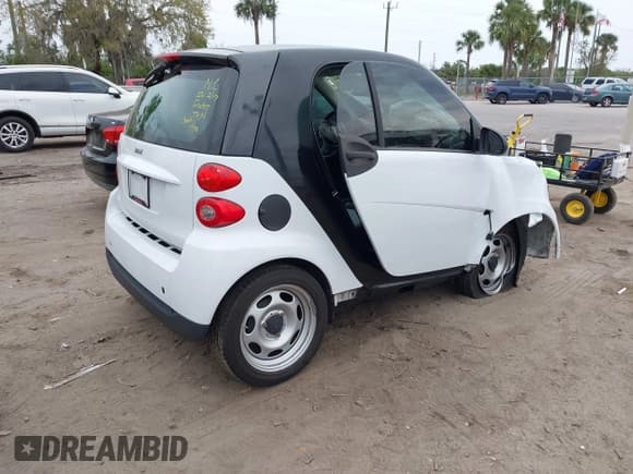 ✅ 2009 Smart fortwo Pure • VIN: WMEEJ31X39K314325 • Лот: 41607981. Опубликован ранее на IAAI с пробегом 59 684 миль. Бесплатный доступ к архиву аукционных продаж из США и подробный отчёт об истории автомобиля на DreamBid. Изображение 4.