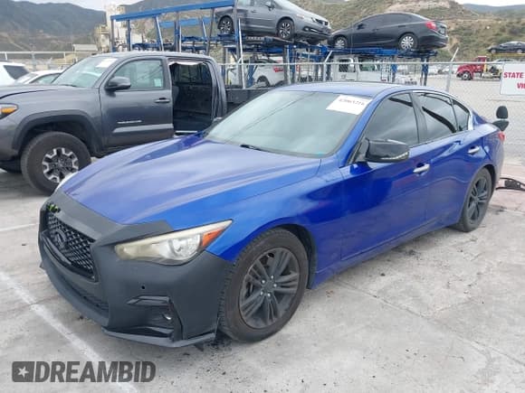 ✅ 2014 Infiniti Q50 • VIN: JN1BV7AP6EM689012 • Lot: 42063216. Listed on IAAI with 114,785 mi. Free auction sales archive from the USA and detailed vehicle history report at DreamBid. Image 2.