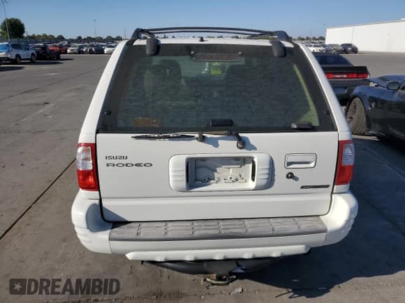 ✅ 2002 Isuzu Rodeo S • VIN: 4S2CK58W624321103 • Lot: 81073485. Wystawiony na Copart z przebiegiem 202 188 mil. Bezpłatny archiwum sprzedaży aukcyjnych z USA i szczegółowy raport historii pojazdu na DreamBid. Zdjęcie 6.