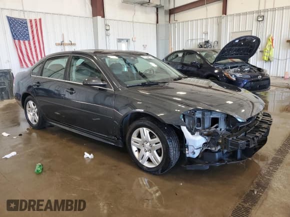 ✅ 2014 Chevrolet Impala LT • VIN: 2G1WB5E39E1100977 • Лот: 75758804. Опубликован ранее на Copart с пробегом 143 831 миль. Бесплатный доступ к архиву аукционных продаж из США и подробный отчёт об истории автомобиля на DreamBid. Изображение 4.