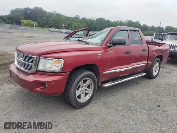 2010 Dodge Dakota Laramie z VIN 1D7CW5GP3AS156914, wystawiony jako IAAI lot #42569804 z przebiegiem 198 463 mil mil oraz . Historia ofert i sprzedaży dostępna na DreamBid. Obrazek 16.