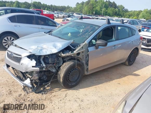 ✅ 2017 Subaru Impreza • VIN: 4S3GTAA63H1734443 • Lot: 42392197. Listed on IAAI with 141,479 mi. Free auction sales archive from the USA and detailed vehicle history report at DreamBid. Image 2.