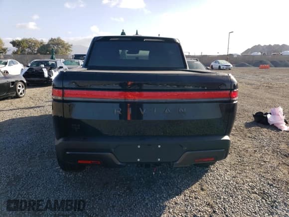 ✅ 2025 Rivian R1T Adventure • VIN: 7FCTGBAAXSN034913 • Lot: 84843944. Listed on Copart with Not provided. Free auction sales archive from the USA and detailed vehicle history report at DreamBid. Image 6.