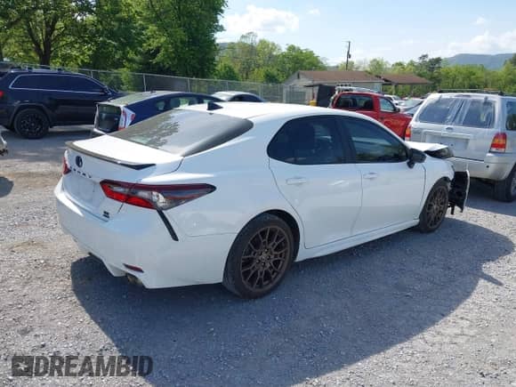 2023 Toyota Camry SE with VIN 4T1T11BK9PU079486, listed as a IAAI auction lot 42144138 with 49,598 mi miles and . Bid and sale history available at DreamBid. Image 4.