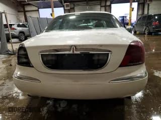 ✅ 2002 Lincoln Continental • VIN: 1LNHM97V82Y679836 • Lot: 89309585. Wystawiony na Copart z przebiegiem 96 773 mil. Bezpłatny archiwum sprzedaży aukcyjnych z USA i szczegółowy raport historii pojazdu na DreamBid. Zdjęcie 6.