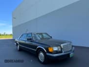 ✅ 1986 Mercedes-Benz 560 • VIN: WDBCA39D0GA203068 • Lot: 56704555. Listed on Copart with 107,817 mi. Free auction sales archive from the USA and detailed vehicle history report at DreamBid. Image 1.