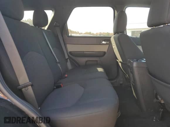 2011 Mercury Mariner с VIN 4M2CN8B78BKJ03563, выставлен на аукционе Copart как лот 90865275 с пробегом 84 082 миль миль и Списание • Salvage title. История ставок и продаж доступна на DreamBid. Изображение 11.