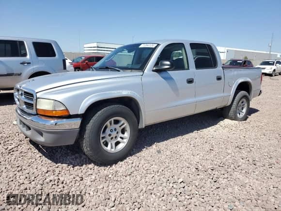 2004 Dodge Dakota SLT z VIN 1D7HL48N94S717644, wystawiony jako Copart lot #71394124 z przebiegiem 155 892 mil mil oraz Szkoda całkowita • Salvage title. Historia ofert i sprzedaży dostępna na DreamBid. Obrazek 1.