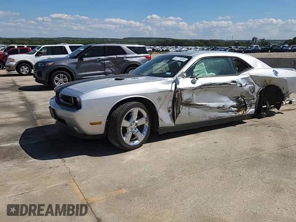 2009 Dodge Challenger R/T with VIN 2B3LJ54T79H602061, listed as a Copart auction lot 81770335 with 69,701 mi miles and Salvage title. Bid and sale history available at DreamBid. Image 13.