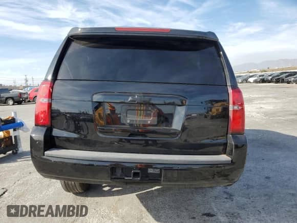 2018 Chevrolet Suburban LS z VIN 1GNSCGEC4JR383988, wystawiony jako Copart lot #43199585 z przebiegiem 79 469 mil mil oraz Szkoda całkowita • Salvage title. Historia ofert i sprzedaży dostępna na DreamBid. Obrazek 6.