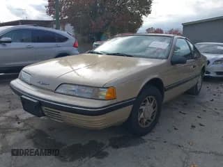 ✅ 1990 Ford Thunderbird • VIN: 1FAPP6040LH137192 • Лот: 43741206. Опубликован ранее на IAAI с пробегом 100 870 миль. Бесплатный доступ к архиву аукционных продаж из США и подробный отчёт об истории автомобиля на DreamBid. Изображение 2.