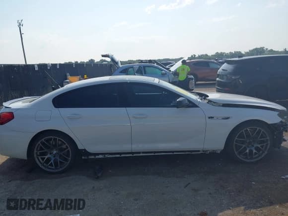 ✅ 2015 BMW 6 Series 640i • VIN: WBA6A0C58FD318879 • Lot: 42399723. Listed on IAAI with 94,917 mi. Free auction sales archive from the USA and detailed vehicle history report at DreamBid. Image 14.